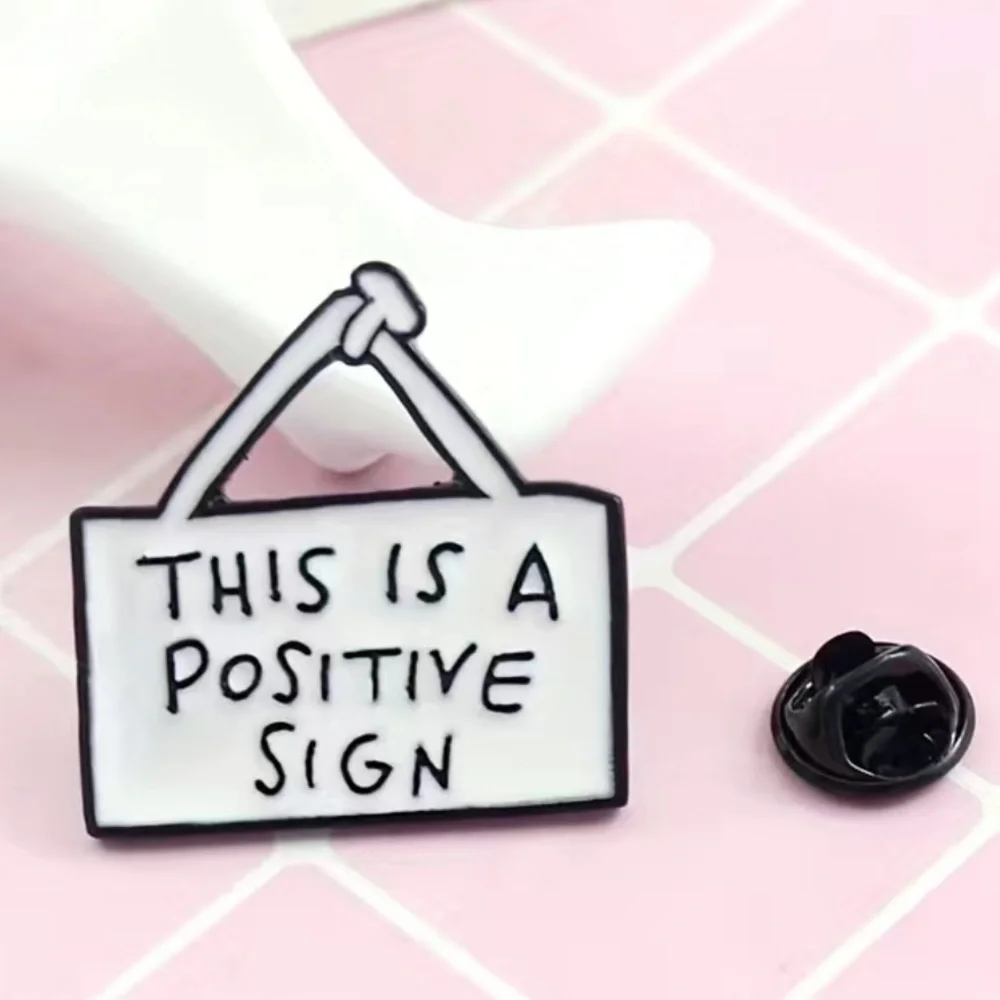 3/$25 Acrylic Pin “This is a Positive Sign” White Sign Pin with Black Le…